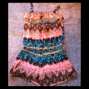 Adorable romper in excellent condition.